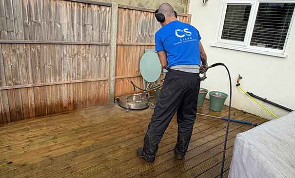 Soft washing render and exterior walls in Epsom to remove algae and staining